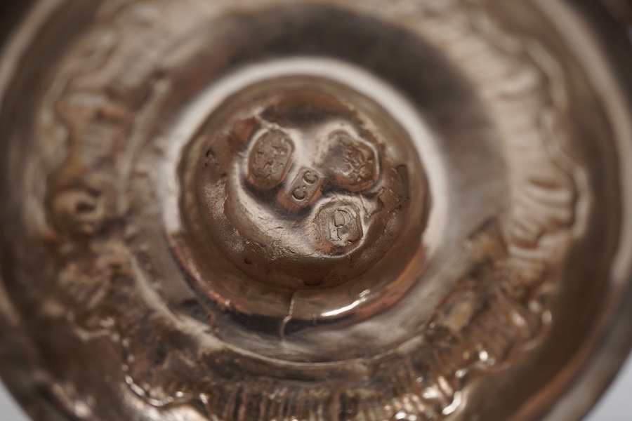 A George III silver inverted pyriform cream jug, with later embossed decoration, Charles Chesterman II, London, 1779?, height 11.4cm.